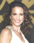 Andie MacDowell with her naturally wavy and curly hair
