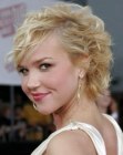 Celebrity Arielle Kebbel sporting a short hairstyle with curls
