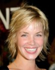 Ashley Scott sporting a short shag haircut