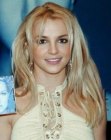 Britney Spears rocking a long open hairstyle with layering for volume