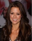 Brooke Burke's shiny long hair that falls past her shoulders