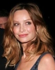 Calista Flockhart's long hairstyle with semi-round curls