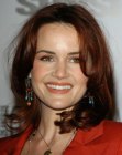 Carla Gugino with her hair cut into a medium length style with soft razored ends