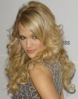 Carrie Underwood's long blonde gypsy hairstyle with curls