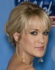Carrie Underwood wearing her hair smoothed back into a soft twist