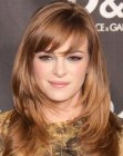 Danielle Panabaker with her long layered styled to frame the face