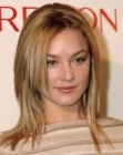 Elisabeth Rohm wearing long razor-cut hair with layers that start below the cheekbones