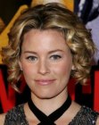 Elizabeth Banks wearing short formal hair with suasage curls