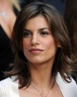 Elisabetta Canalis with her hair cut in a simple and carefree shoulder length style