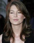 Ellen Pompeo with her long hair brushed away from her face