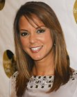 Eva LaRue's long silky hair with multiple shades 