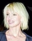 Faith Hill's bleached blond hair cut in a medium long bob