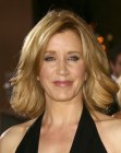 Felicity Huffman's medium length hairstyle with elegant waved sides