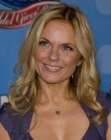 Geri Halliwell wearing her hair long with added curl for volume