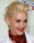 Gwen Stefani's 1950s or 1960s updo with waves and curls