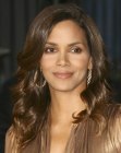 Halle Berry's long hairstyle with wavy styling around the face