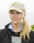 Heather Locklear wearing her long hair in a sporty ponytail