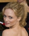 Heather Graham wearing her hair up with cascading curls