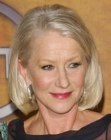 Helen Mirren with her blonde hair cut into a medium long blunt bob