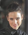 Jennifer Connelly with her hair up in an old-fashioned bun