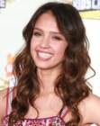 Jessica Alba sporting long hair with curls