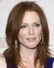 Julianne Moore wearing her hair in a simple long style with flipped ends