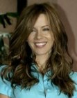 Kate Beckinsale sporting long brown hair with highlights