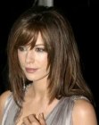 Kate Beckinsale's long angled hairstyle with layers and smooth styling