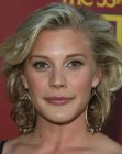 Katee Sackhoff rocking a blonde mmedium length shag with curled under sides