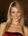 Katrina Bowden wearing her sleek long blonde hair with a side part