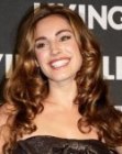 Kelly Brook's shiny long hair with curls