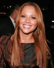 Kimberley Walsh wearing her glossy long hair with a center part
