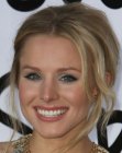 Kristen Bell's up-style with the hair knotted at the nape