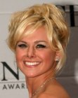 Laura Bell Bundy's up-style with lazy sections and bangs