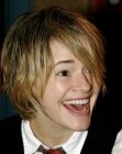 Leisha Hailey with her neck length hair cut in a shag