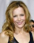 Leslie Mann's long layered hair with curls