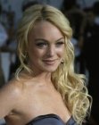 Lindsay Lohan wearing her blonde hair long with curls