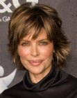 Lisa Rinna's youthful short hairstyle with layers and bangs