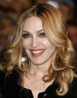 Madonna's long hairstyle with curls and foiled hair colors