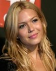 Mandy Moore's long blonde hair with some curling at the ends