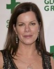 Marcia Gay Harden sporting a long and easy to manage hairstyle
