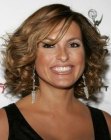 Mariska Hargitay wearing her hair in a style with volume that touches the shoulders