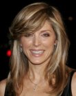 Marla Maples wearing her hair long with smoothed layers