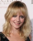 Marley Shelton sporting a long shag style with razor cutting