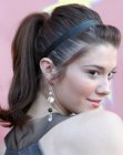 Mary Elizabeth Winstead with her hair styled up into a ponytail