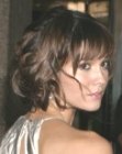 Mary Elizabeth Winstead with her hair styled up and looking shorter