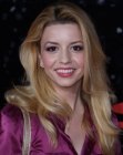 Masiela Lusha's long hairstyle with large waves