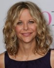 Meg Ryan with curled shoulder length hair