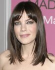 Michelle Monaghan wearing her brunette hair very smooth and below her shoulders