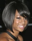 Monique Coleman sporting a modified bob haircut with angled sections